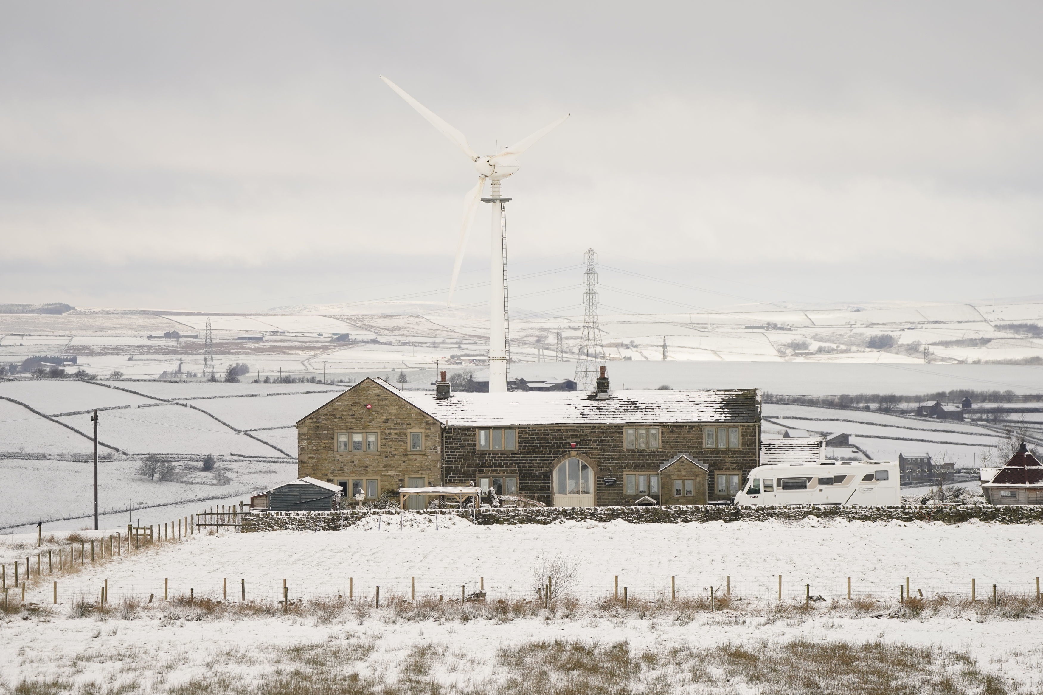 Snow blankets the village of Pole Moor, Kirklees