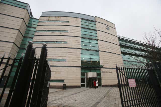 A man has been remanded in custody on charges in connection with a security alert at a venue in Belfast where Irish Foreign Affairs Minister Simon Coveney was speaking (Niall Carson/PA)