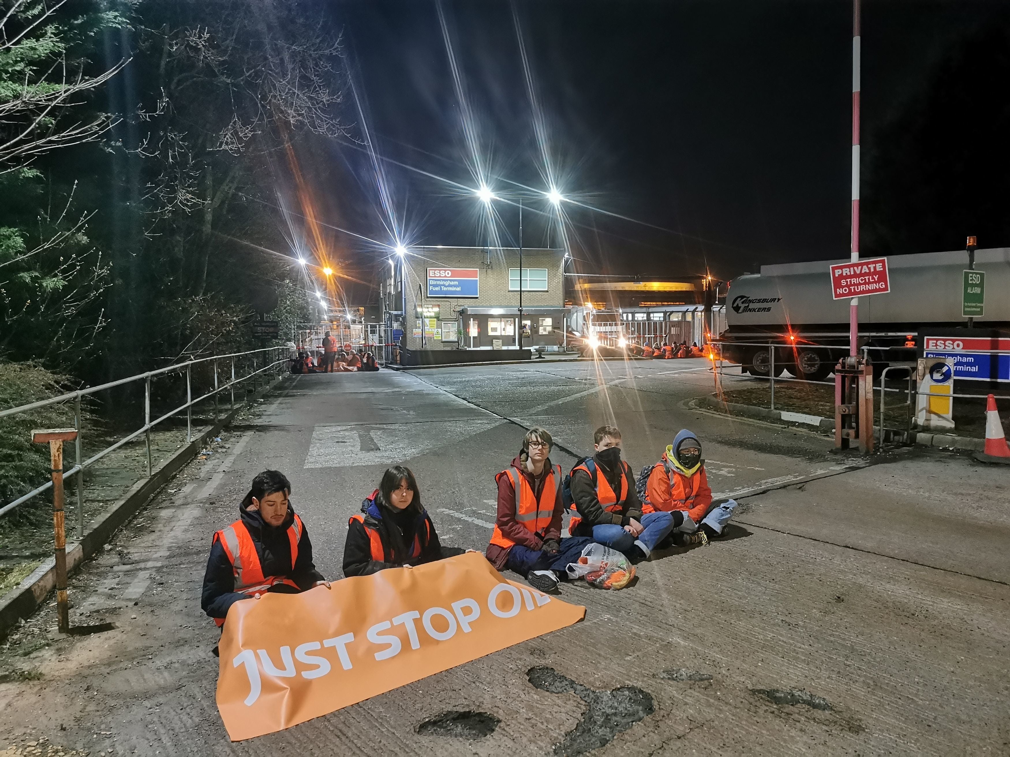 Just Stop Oil activists during their blockade of Esso Birmngham Fuel Terminal
