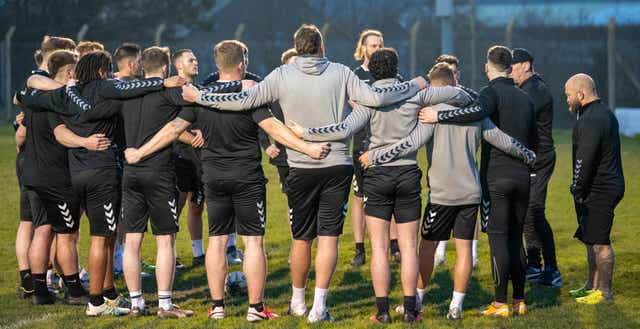 Coach Neil Kelly and his Cornwall squad in training for their first game (Patrick Tod/PA)
