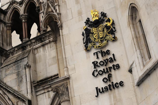 A hearing at the Royal Courts of Justice in London on Friday was told that a settlement had been reached in the dispute between Brian Hitchin and Channel 5 (Anthony Devlin/PA)