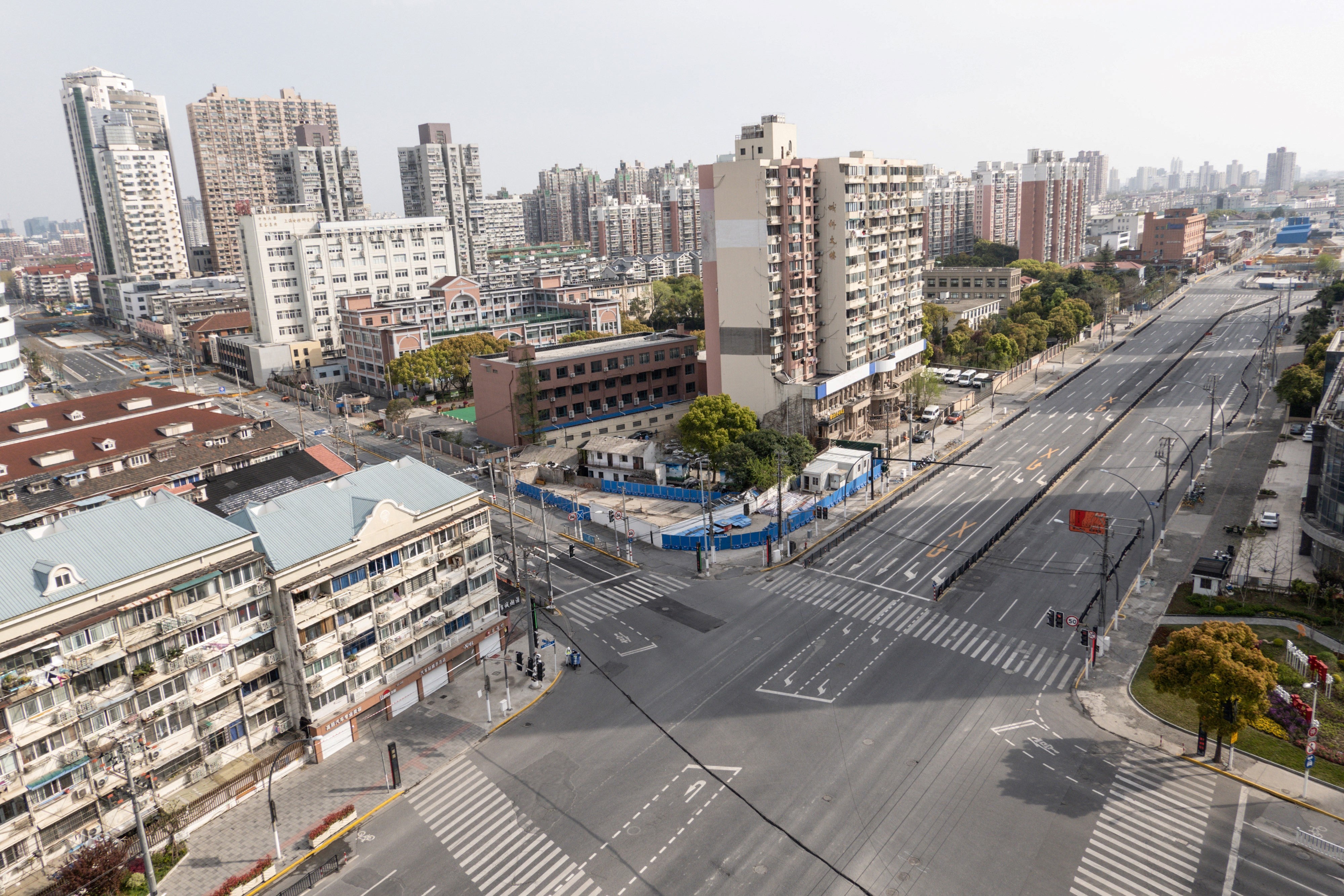 File photo: A general view shows empty streets during the second stage of a Covid lockdown in the Yangpu district in Shanghai, 1 April 2022