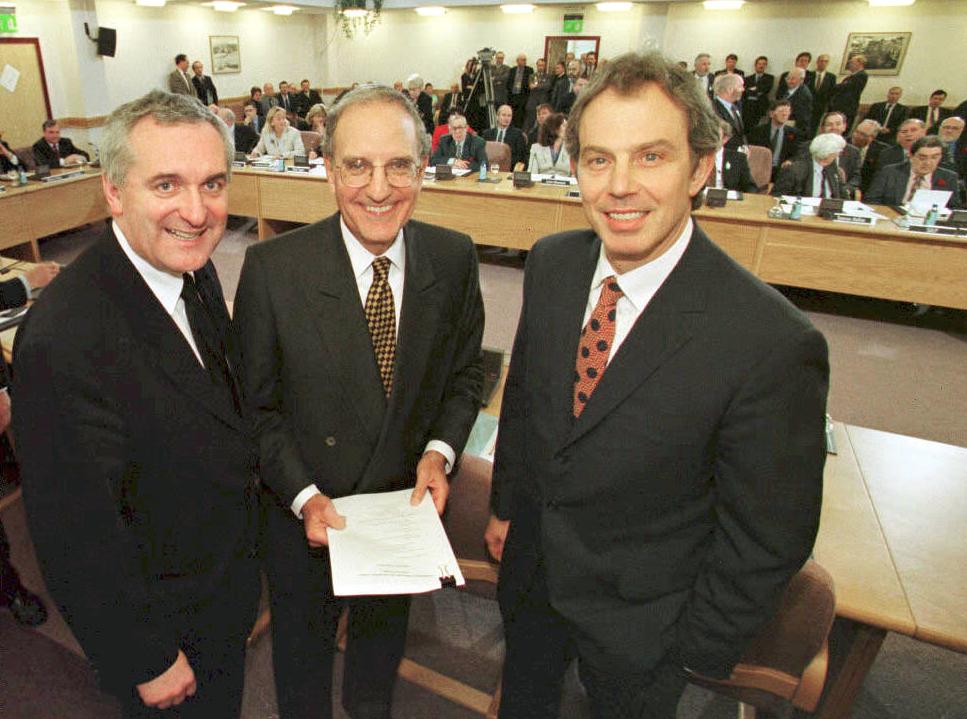 Tony Blair with US senator George Mitchell (centre) and Irish prime minister Bertie Ahern on 10 April 1998 after signing the Good Friday Agreement