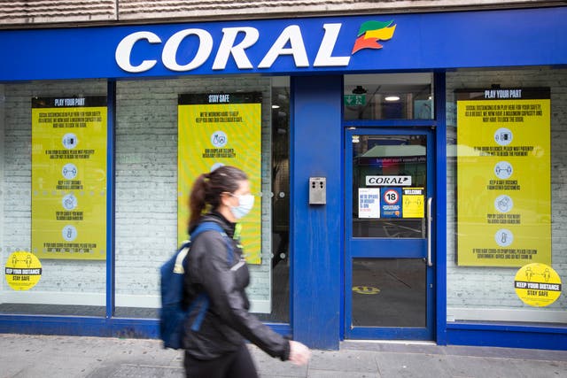 Coral and Ladbroke owner Entain is expected to show a slowdown in online gambling after pandemic restrictions eased (Matt Alexander/PA)