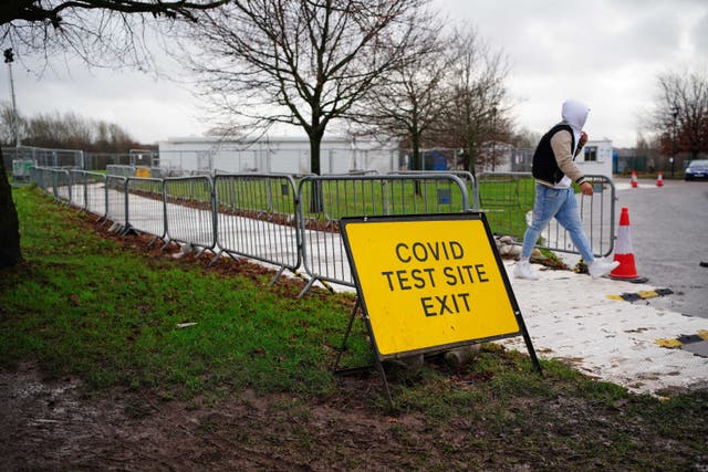 People at a Covid walk-in test centre in Netham Park in Bristol (Ben Birchall/PA)