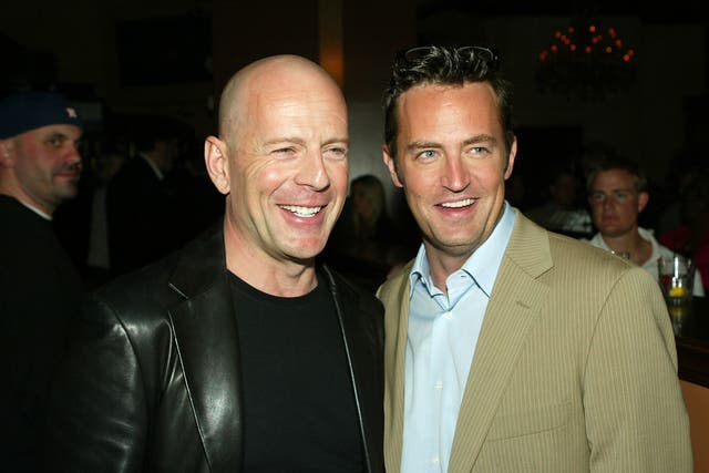 <p>Bruce Willis and Matthew Perry at the after-party for the premiere of ‘The Whole Ten Yards’ in 2004</p>