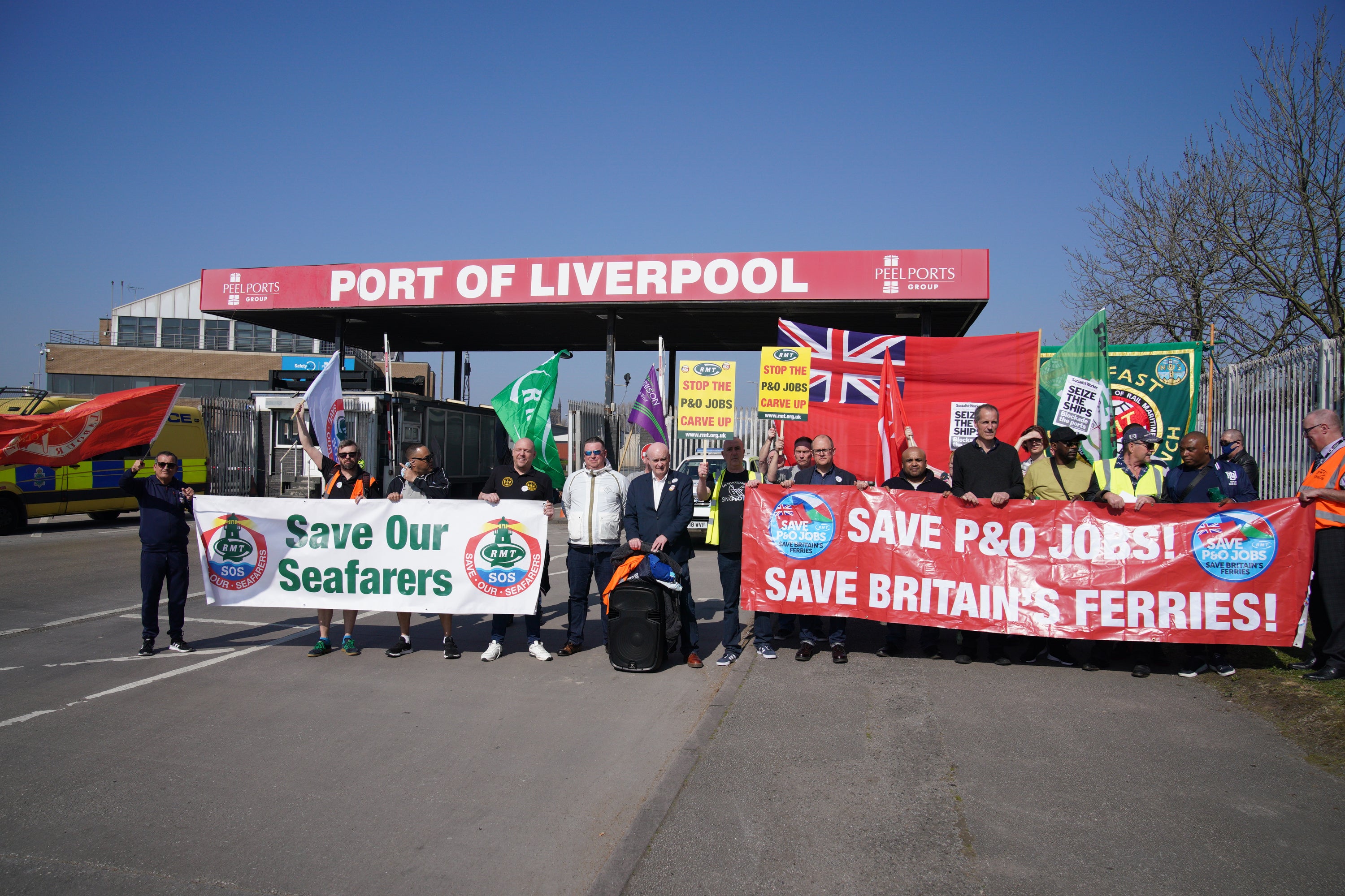 A demonstration against the dismissal of P&O workers takes place outside the Port of Liverpool (Pete Byrne/PA)