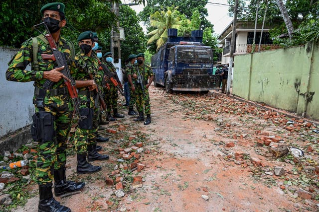 <p>Soldiers secure the area near Sri Lanka's President Gotabaya Rajapaksa's home in Colombo on Friday </p>