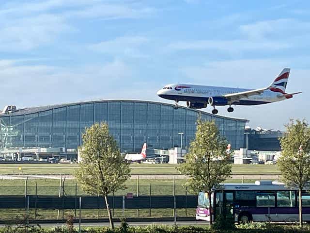 <p>Under pressure: British Airways Airbus A320 landing at Heathrow Airport in front of Terminal 5. BA has made many cancellations of Saturday’s flights</p>