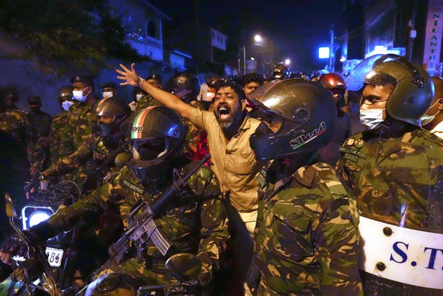 <p>A Sri Lankan man shouts anti government slogans during a protest outside Sri Lankan president’s private residence</p>