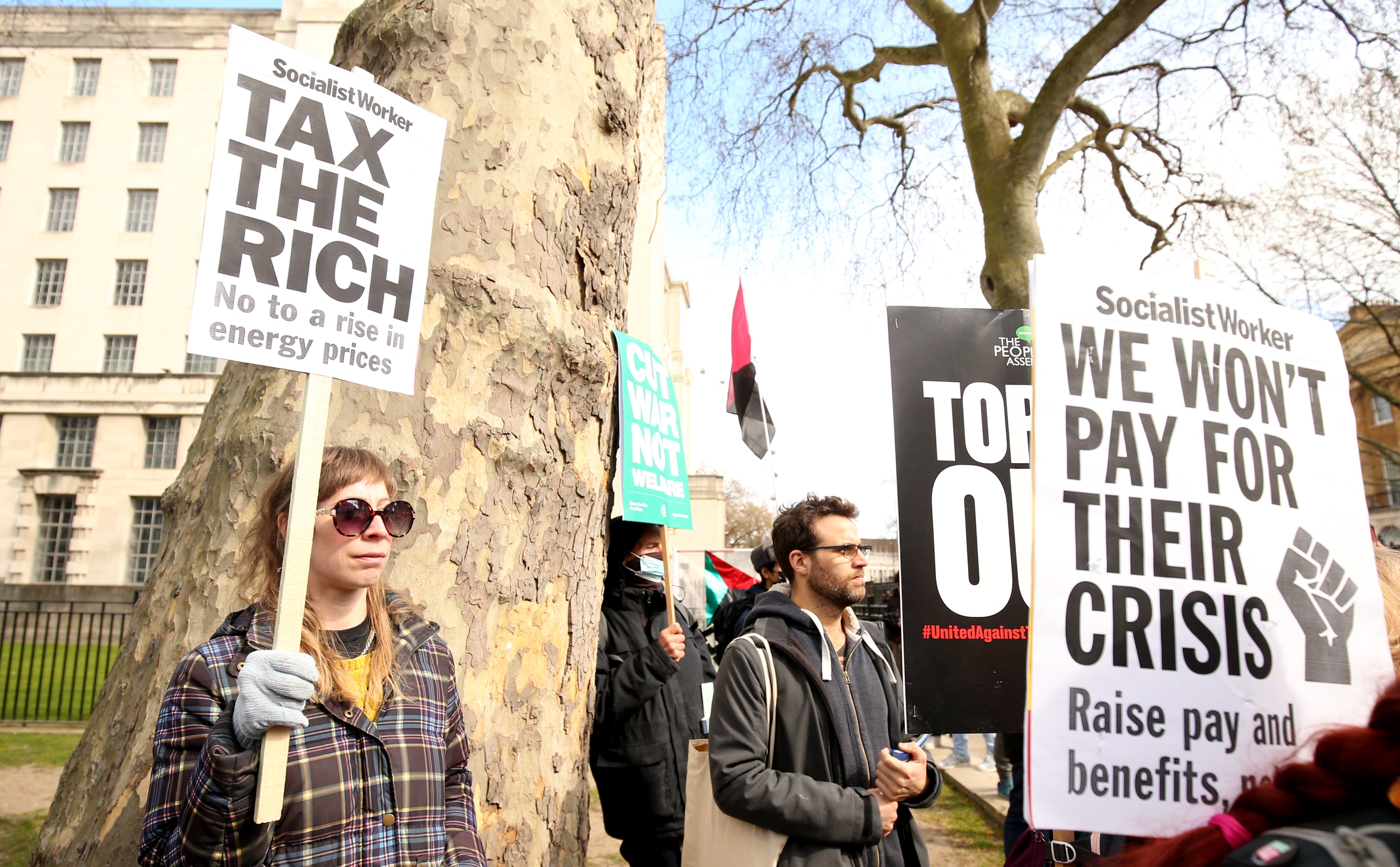 Protesters near Downing Street in central London, at The People’s Assembly Against Austerity protest to highlight those suffering hardship from the cost of living crisis due to the rise in fuel costs, food prices inflation and low pay. Picture date: Saturday April 2, 2022.