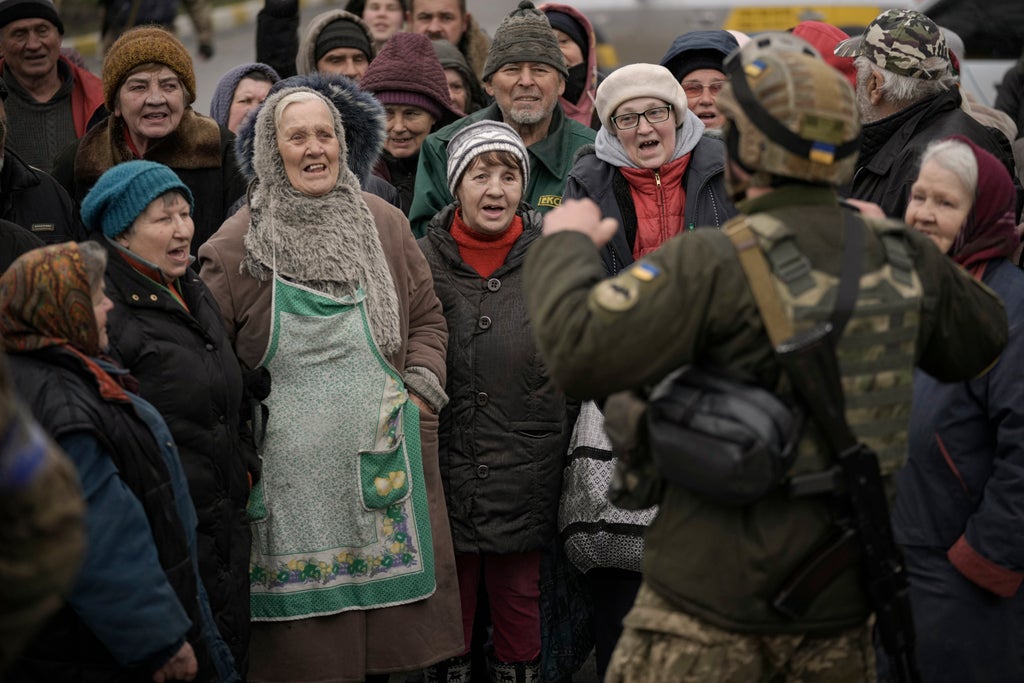 AP PHOTOS on Day 38: Retreating troops leave devastation