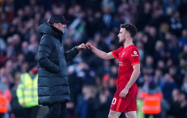 <p>Former Liverpool manager Jurgen Klopp and his friend Diogo Jota (Peter Byrne/PA)</p>