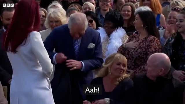 <p>Prince Charles lends Eastenders star his coat after she complains it's freezing</p>