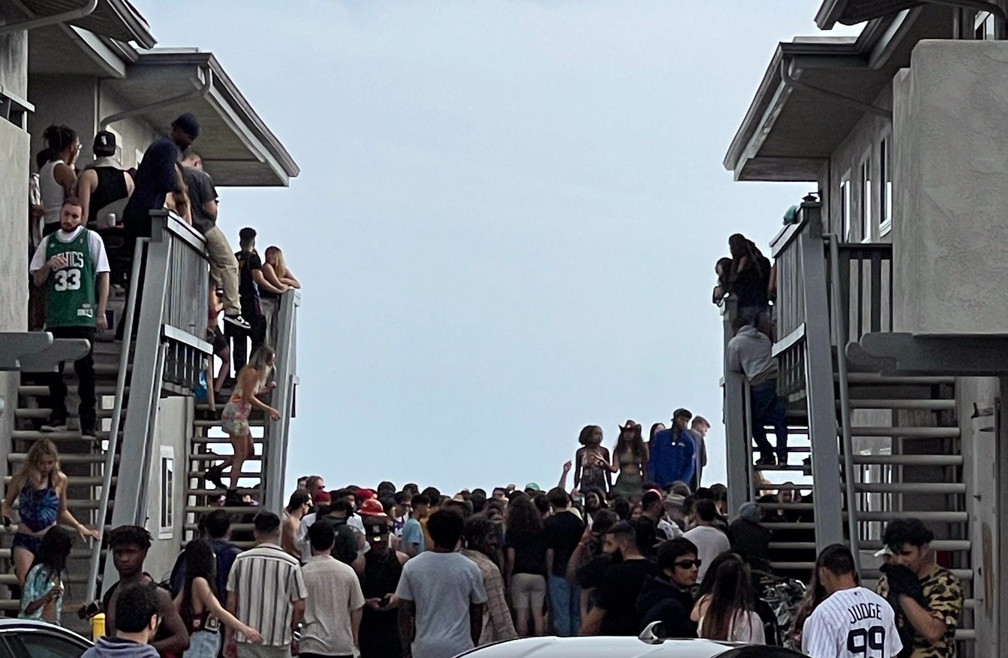 Authorities declared a “multi casualty incident” as thousands of students took part in a chaotic spring break party in California