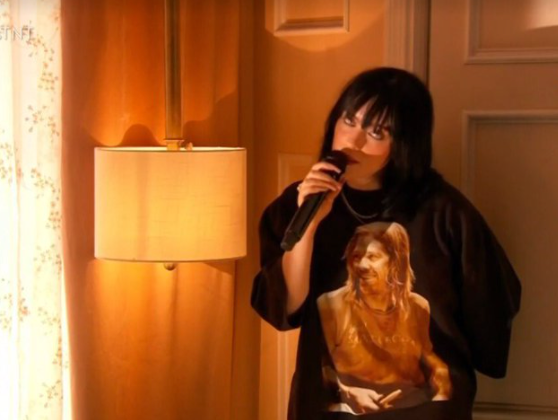 Billie Eilish wearing a Taylor Hawkins T-shirt during her Grammys performance