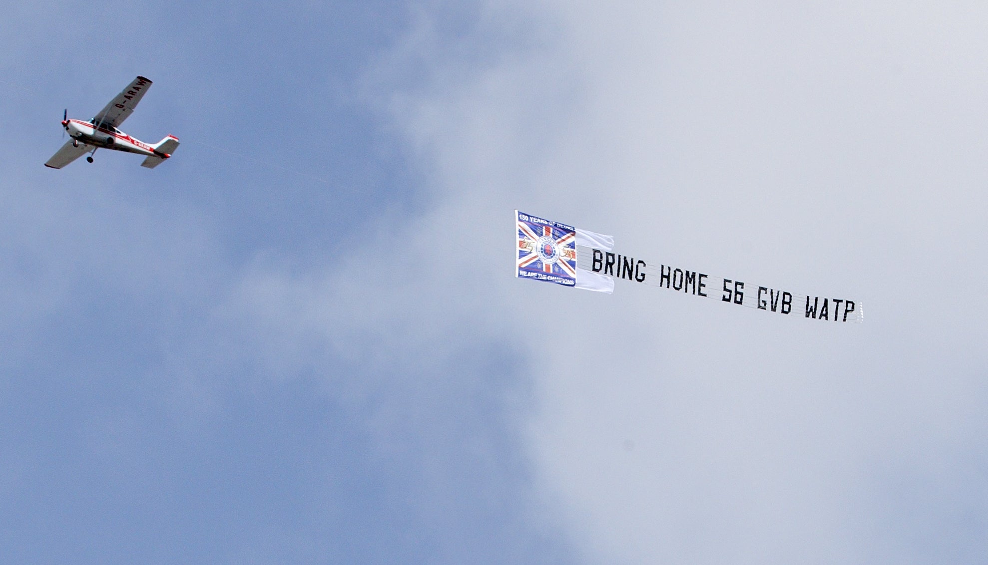 A plane with a banner of support for Rangers flies over Ibrox – but Celtic took a big step towards the title by winning the Old Firm derby 2-1 (Steve Welsh/PA)