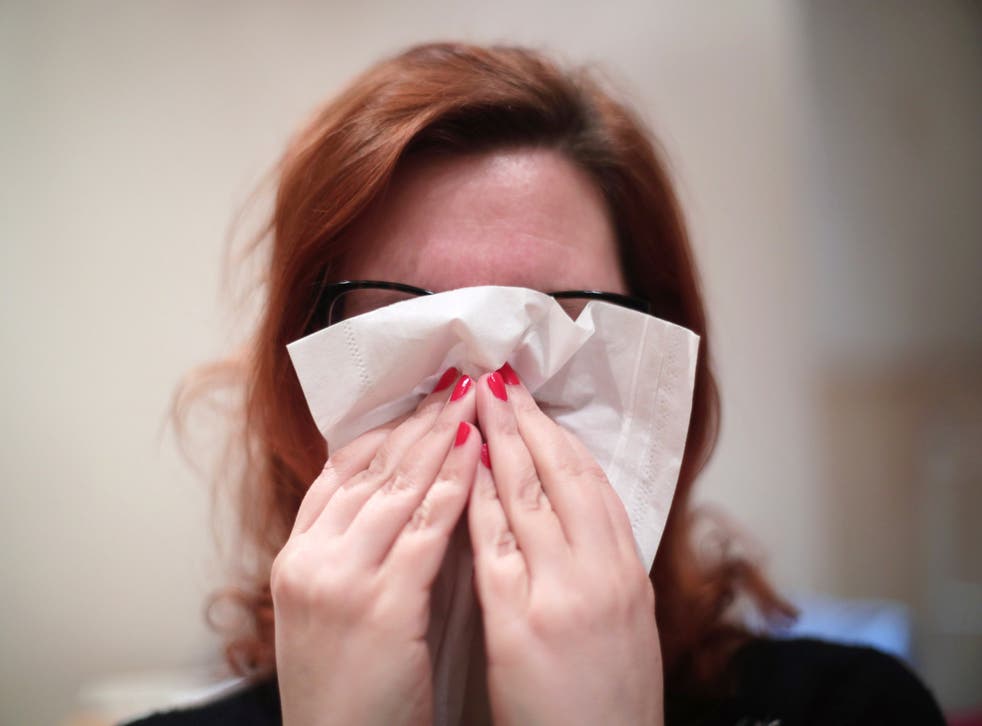 The NHS website states that signs of cough and cold could be Covid-19 (PA)