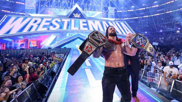 <p>Reigns celebrates unifying the titles</p>