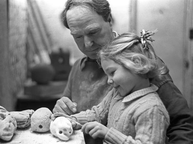 <p>Moore in the workshop with his daughter Mary</p>