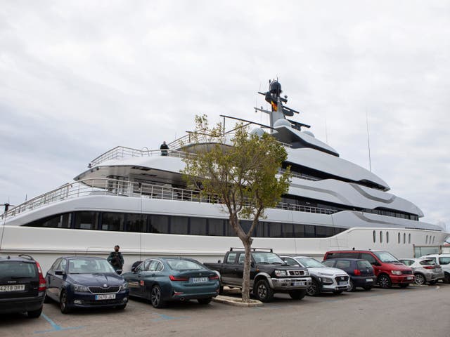 <p>A Civil Guard stands by the yacht called Tango in Palma de Mallorca, Spain</p>