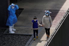Shanghai eases ‘unpopular’ child separation policy but extends Covid lockdown