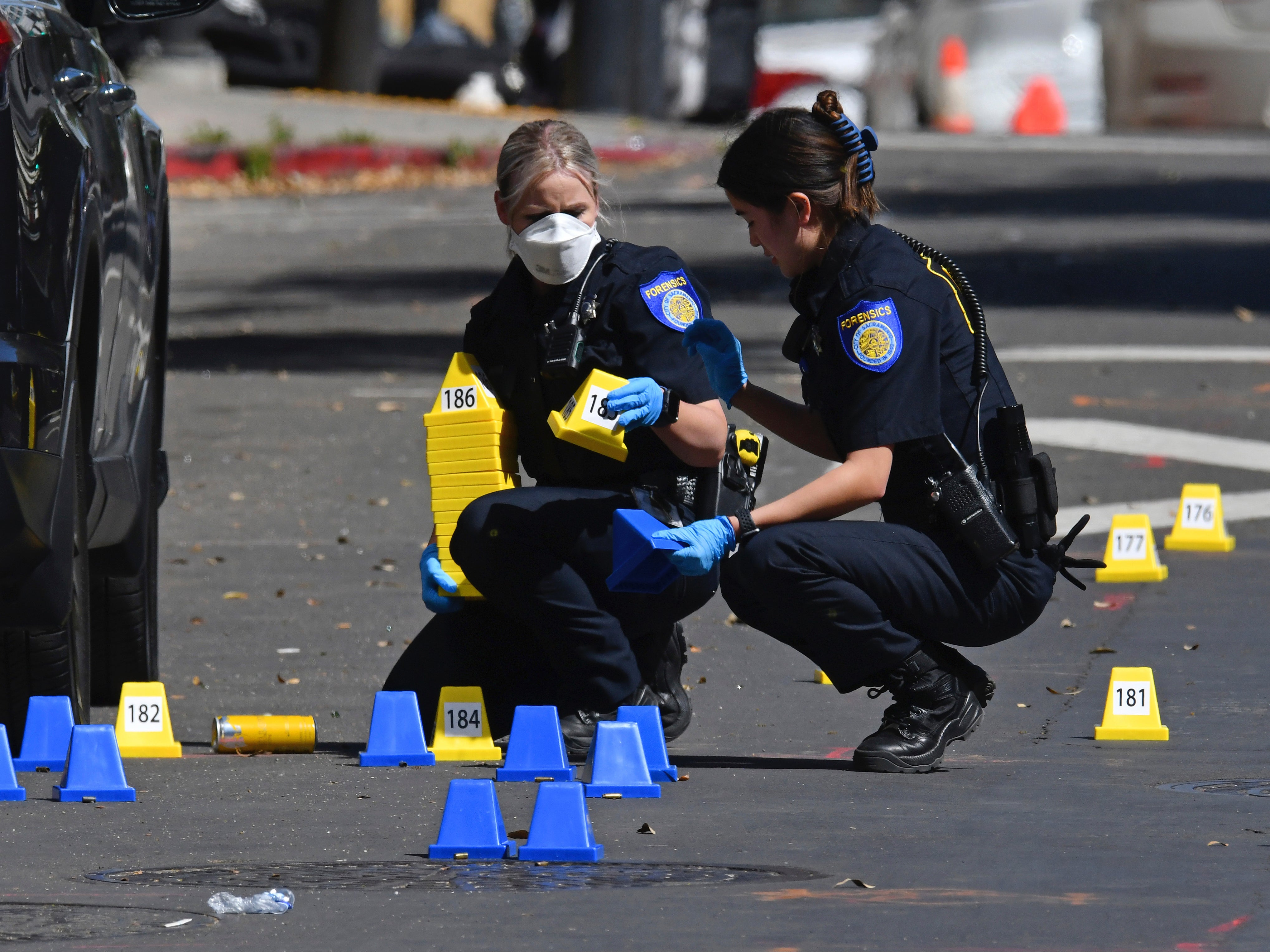 Investigators at the scene of the shooting in Sacramento, California