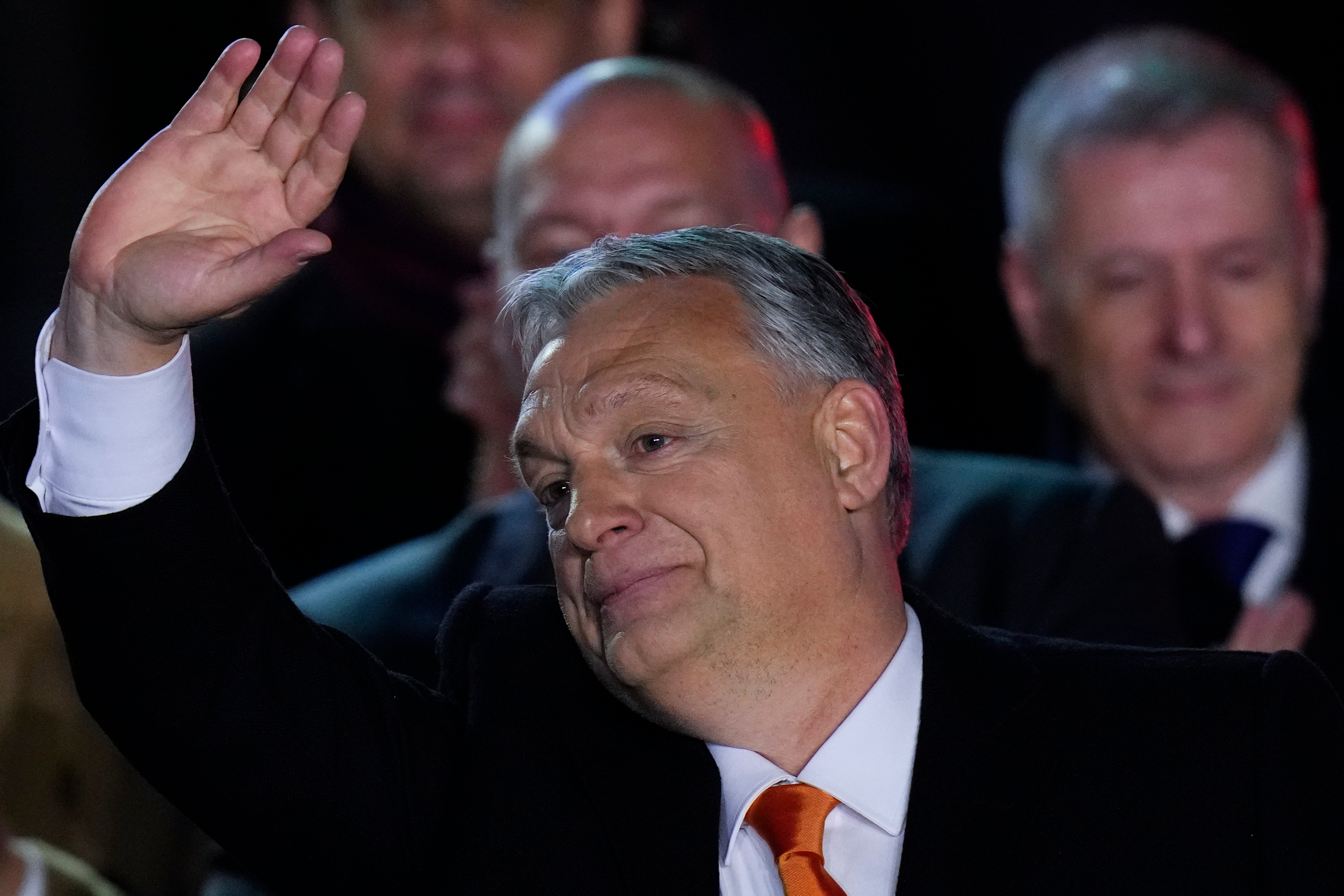 Hungary’s Prime Minister Viktor Orban greets cheering supporters during an election night rally in Budapest on Sunday (AP Photo/Petr David Josek)