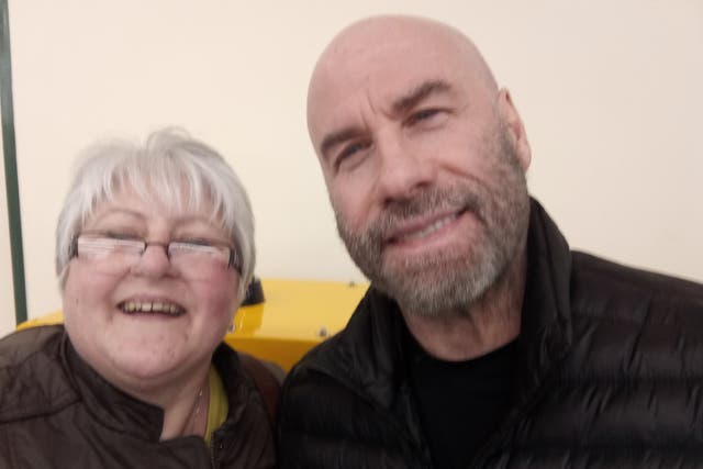 Sam Frary said ‘to say I was thrilled is an understatement’ when she bumped into John Travolta at a Morrisons in Norfolk (Sam Frary/PA)