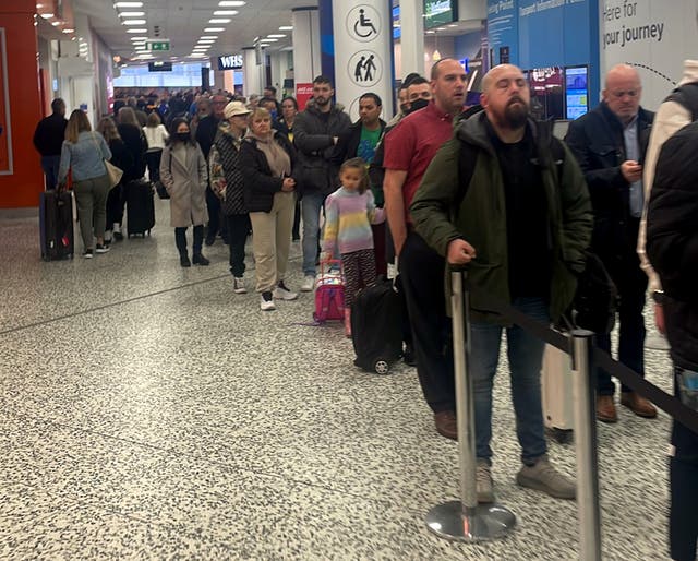<p>Handout photo of the security queue at Birmingham airport on Monday</p>