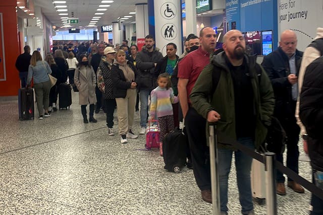 <p>Handout photo of the security queue at Birmingham airport on Monday</p>