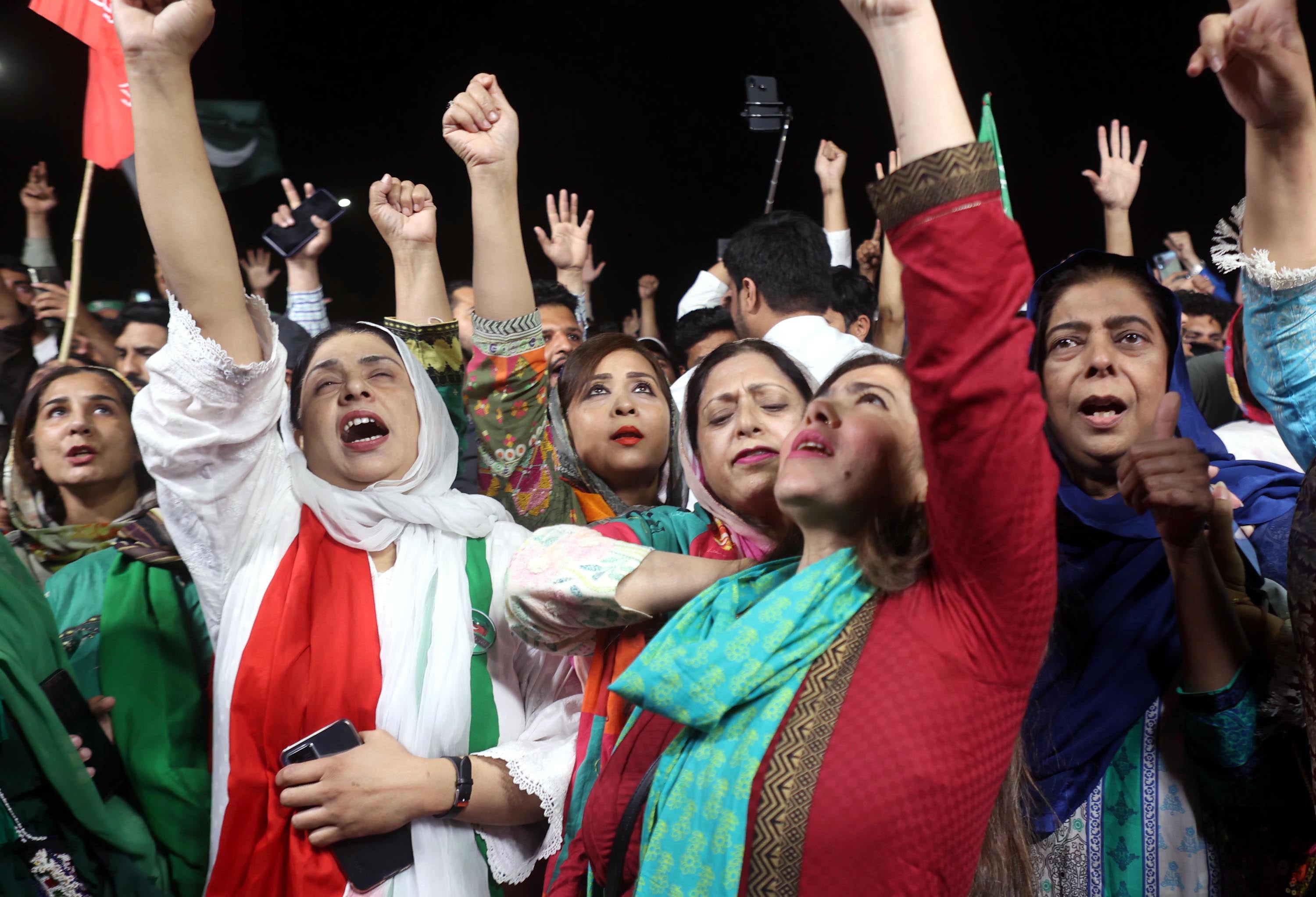 Supporters of incumbent prime minster Imran Khan listen to his speech during a rally in Islamabad, Pakistan