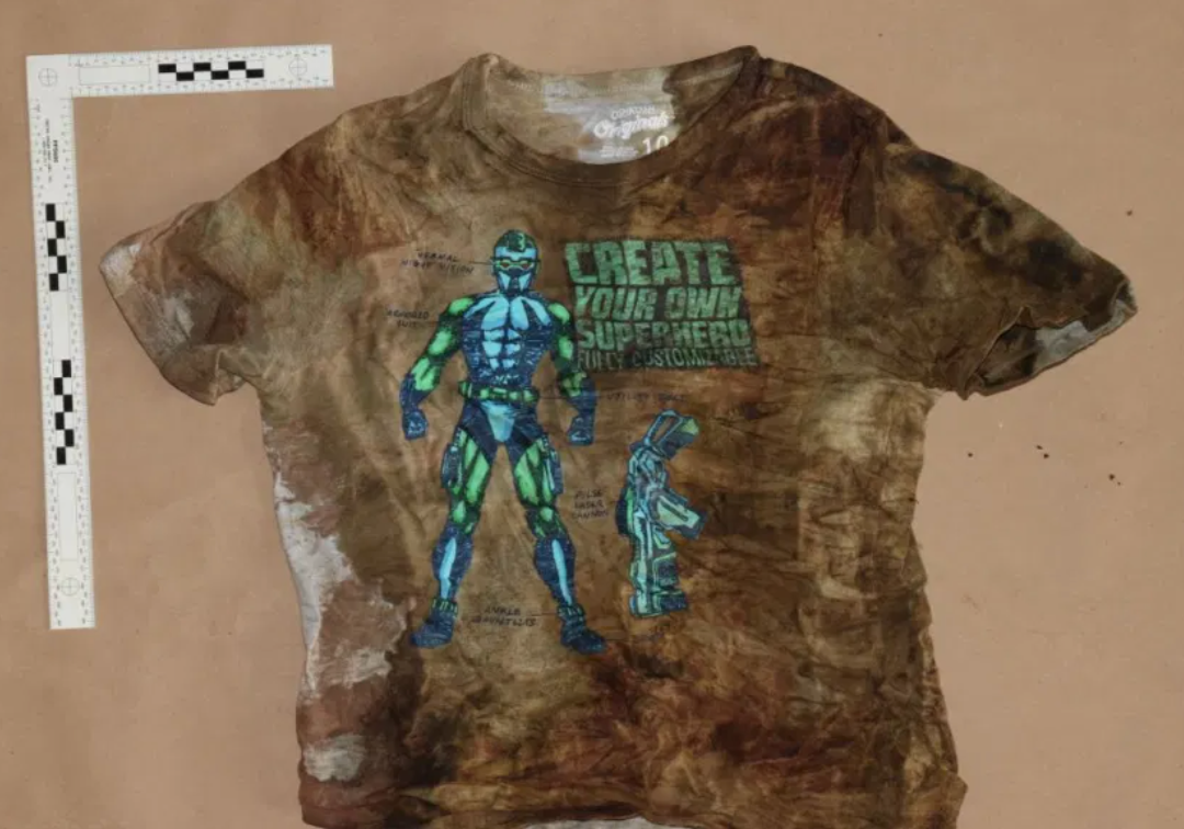 This crime scene photo shows a bloody shirt worn by one of the children allegedly killed by Anthony Todt