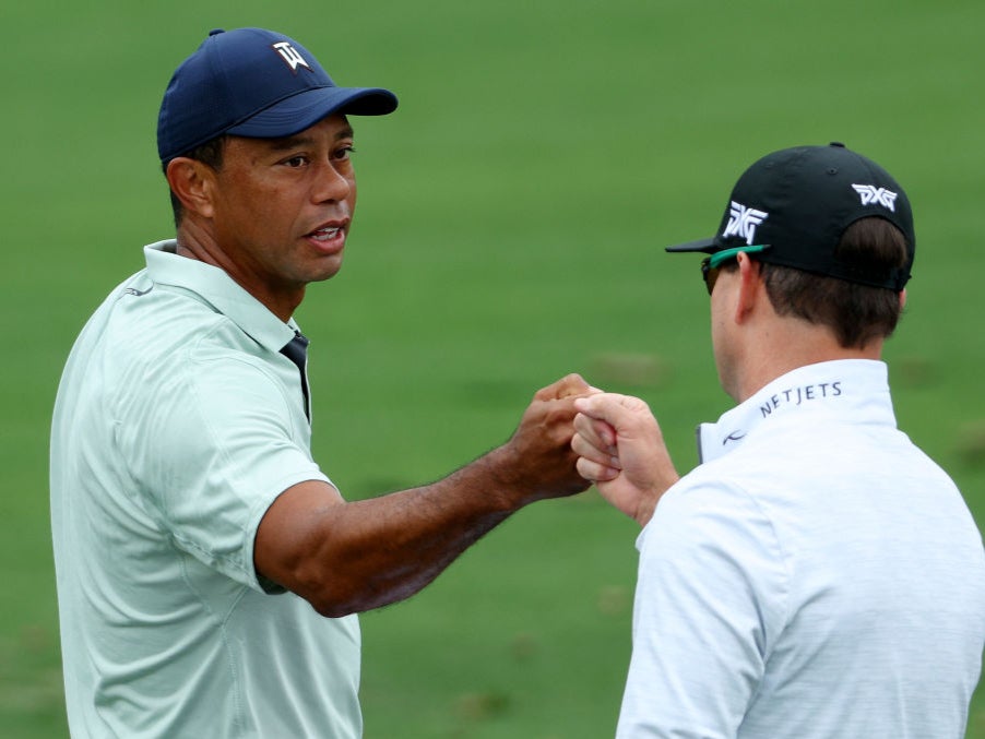 Tiger Woods greets Zach Johnson at Augusta