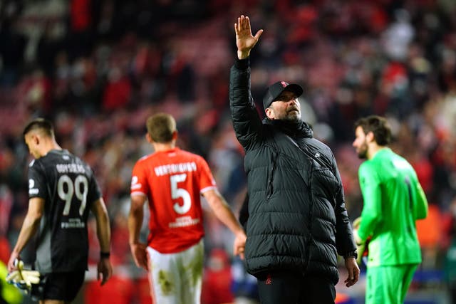 Jurgen Klopp salutes the fans after victory over Benfica (Adam Davy/PA)