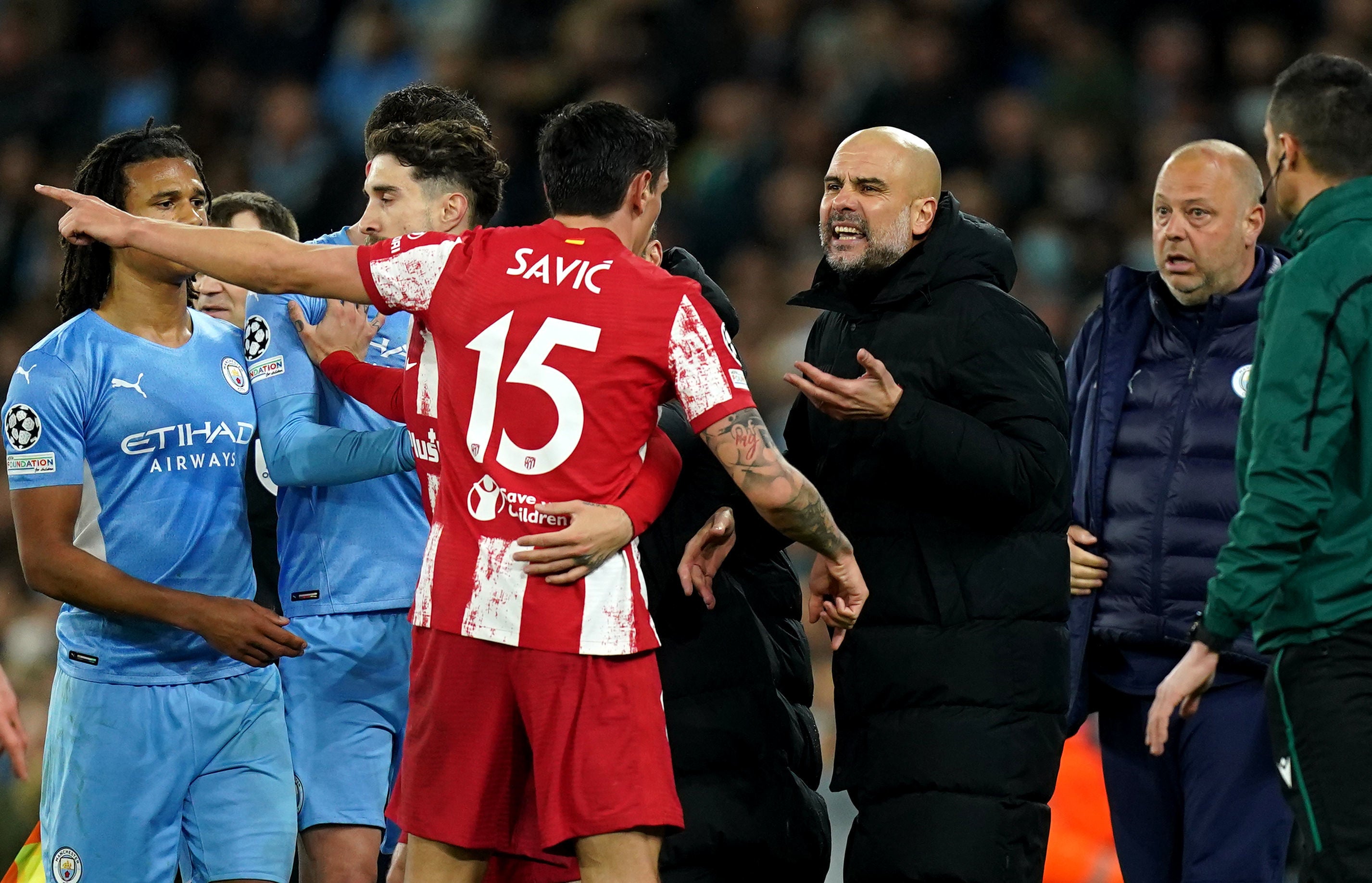 Atletico Madrid players argue with Pep Guardiola