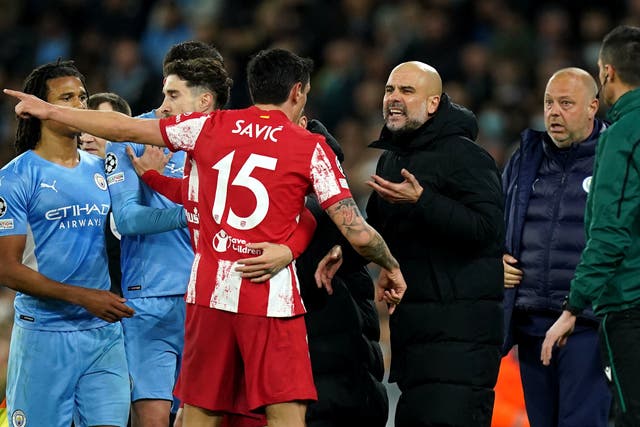 <p>Atletico Madrid players argue with Pep Guardiola</p>