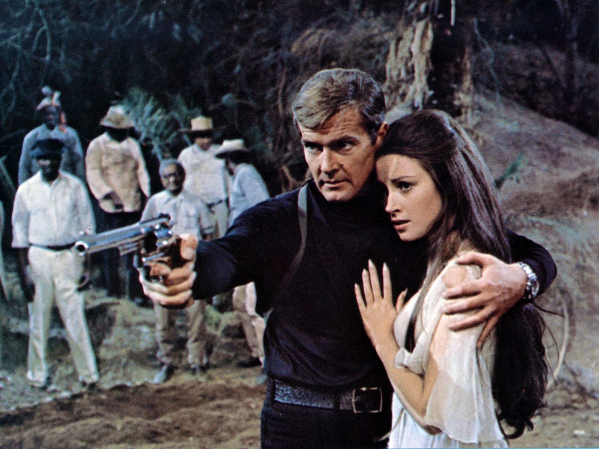 Seymour alongside Roger Moore in ‘Live and Let Die'