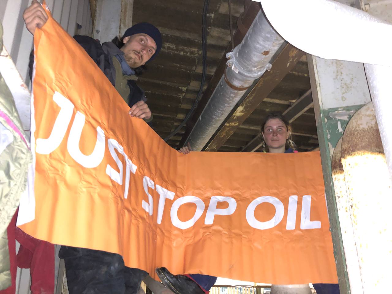 Just Stop Oil activists have climbed on top of tankers and pipes at an oil terminal in Thurrock, Essex, as they call for the government to end all new oil and gas projects