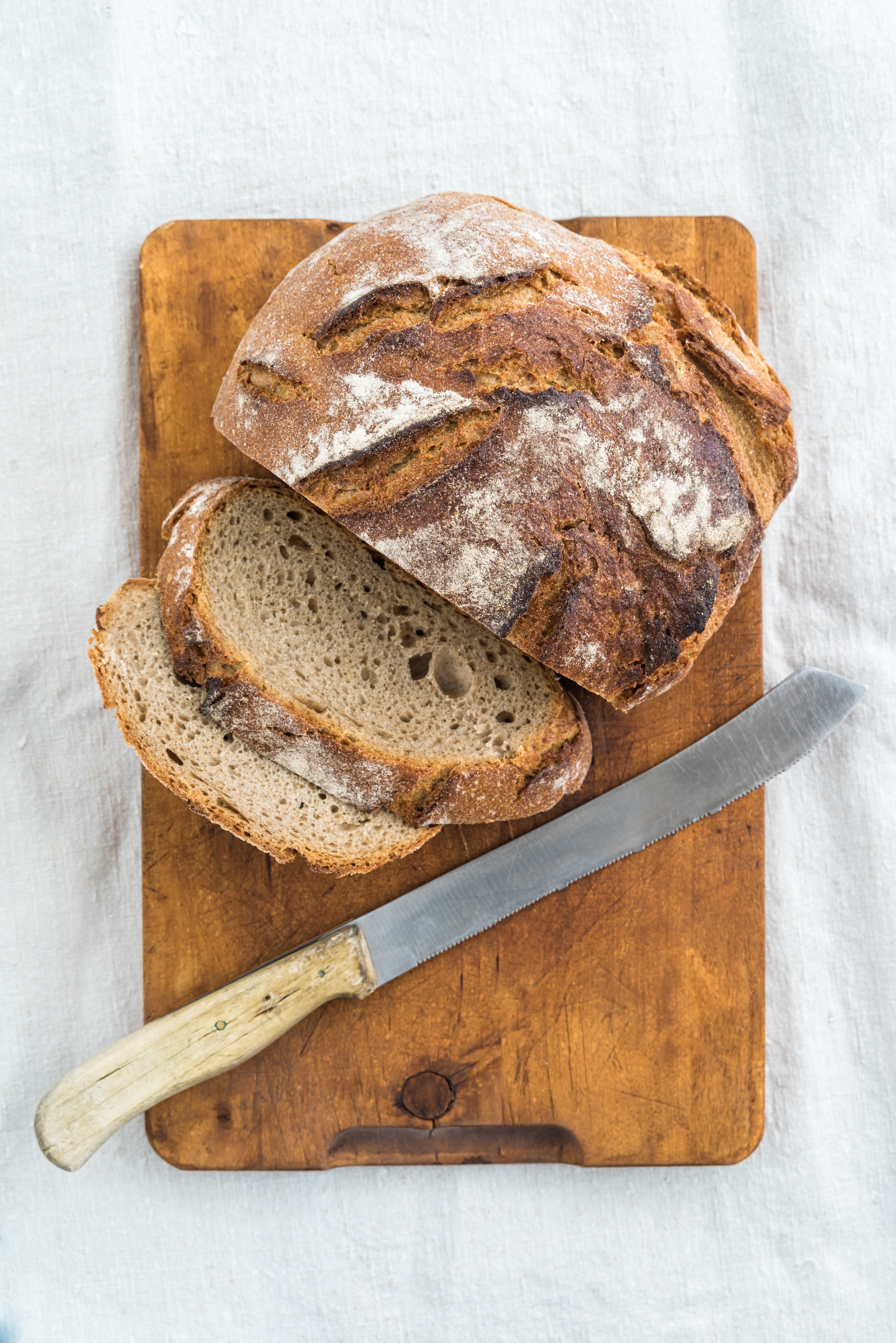 Sourdough, especially the whole wheat kind, is best for optimal flavour and a slight chew