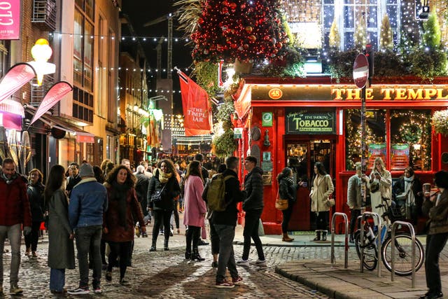 People out socialising in Temple Bar in Dublin city, a popular spot for tourists (Damien Storan/PA)