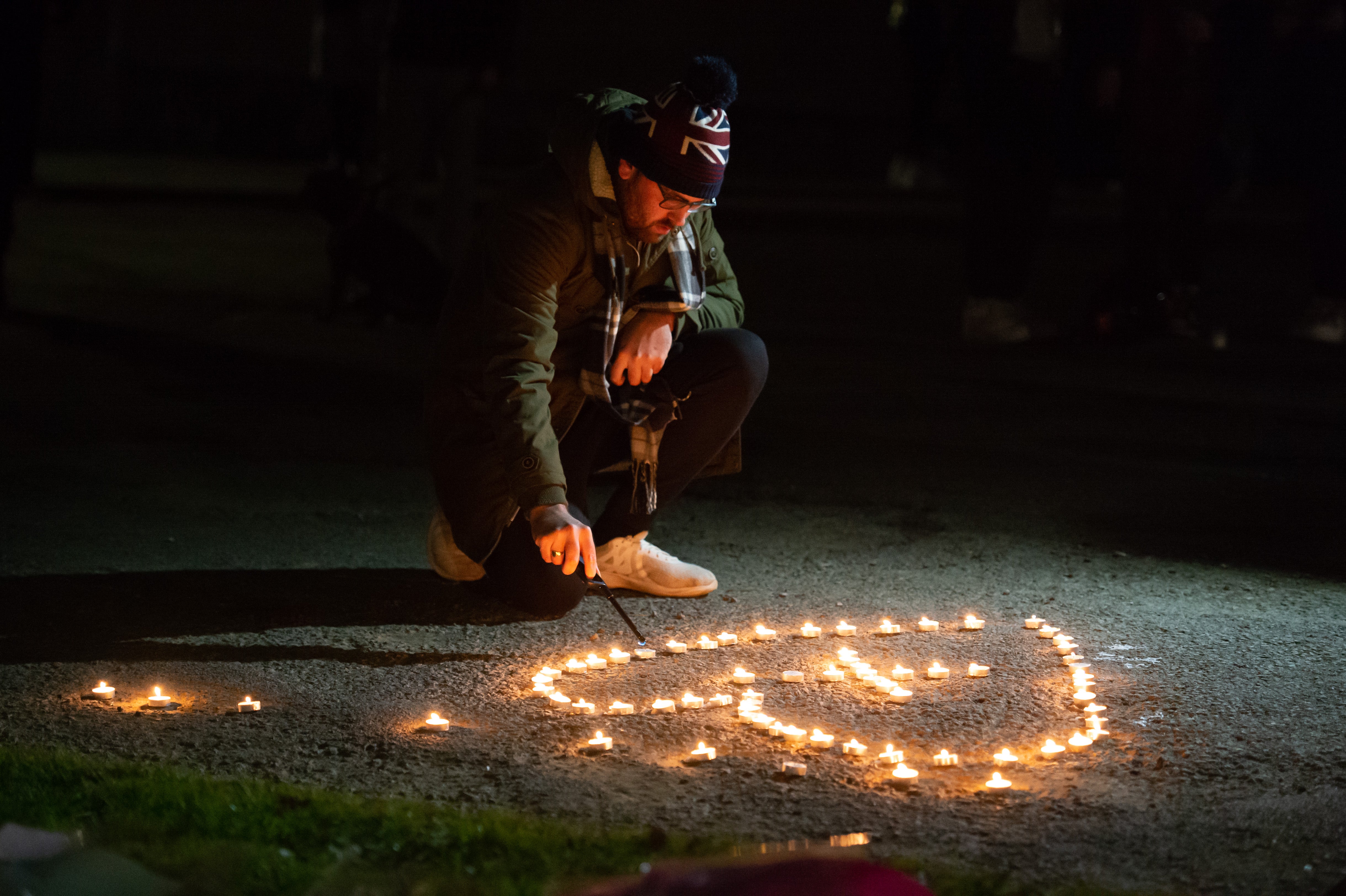 Family, friends and members of the public gathered by Sheepstor Road bus stop in Plymouth for a candlelit vigil in tribute of Bobbi-Anne McLeod