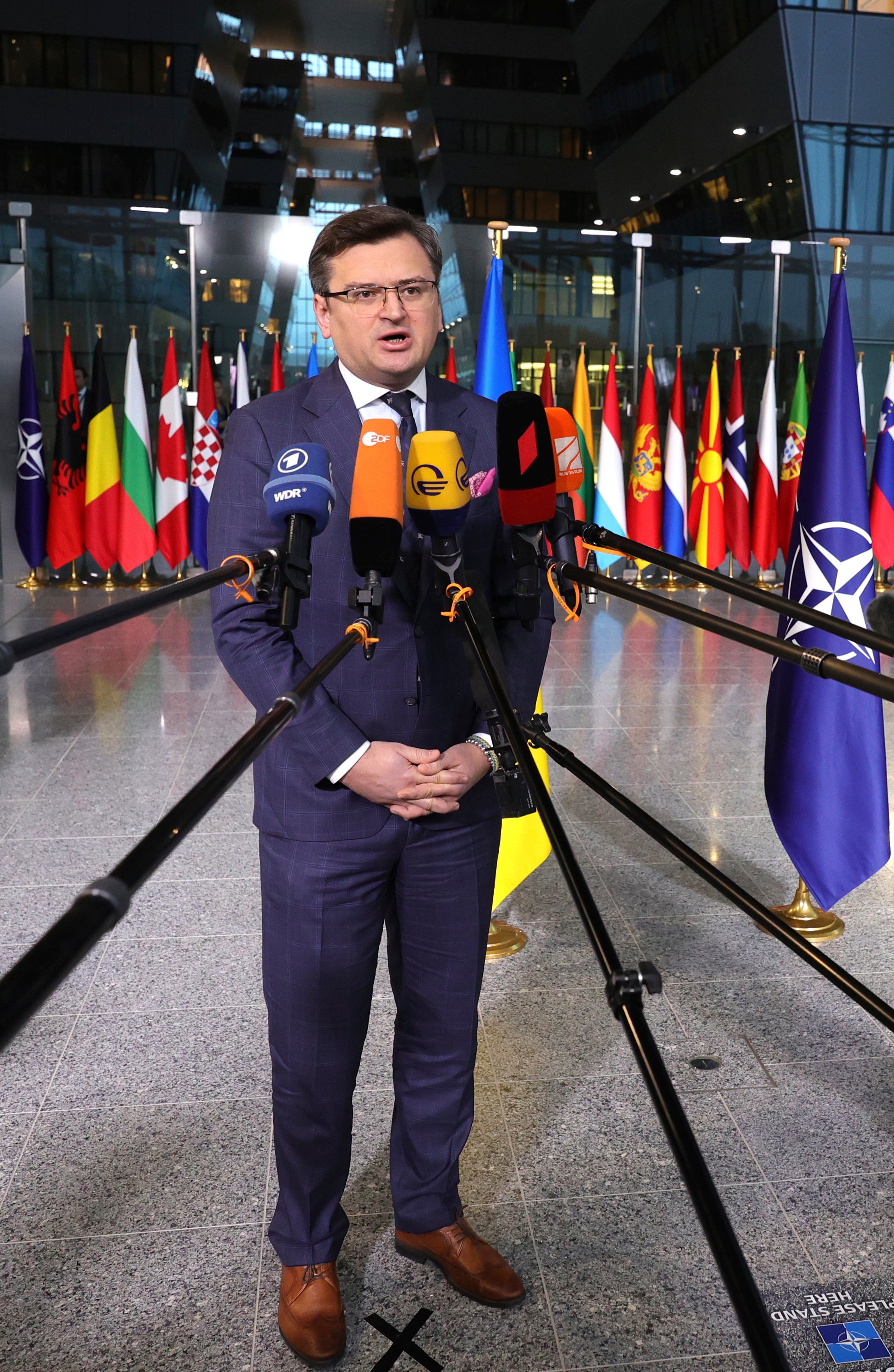 Ukraine’s Foreign Minister Dmytro Kuleba says Nato should send more weapons (Olivier Matthys/AP)