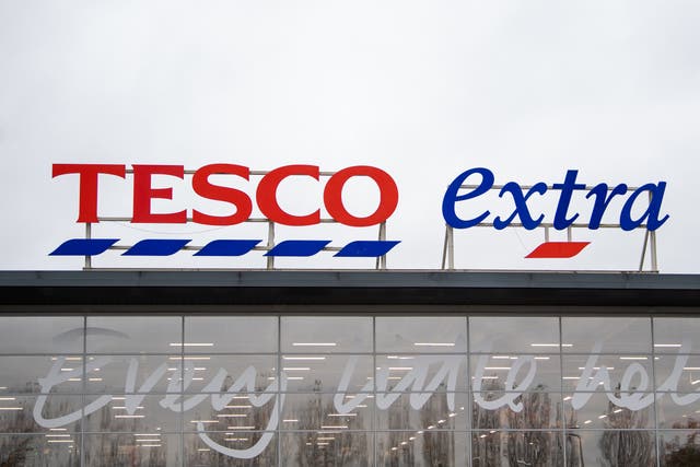 Tesco has announced it will increase staff pay to £10.10 an hour after a £200 million investment (Joe Giddens/PA)