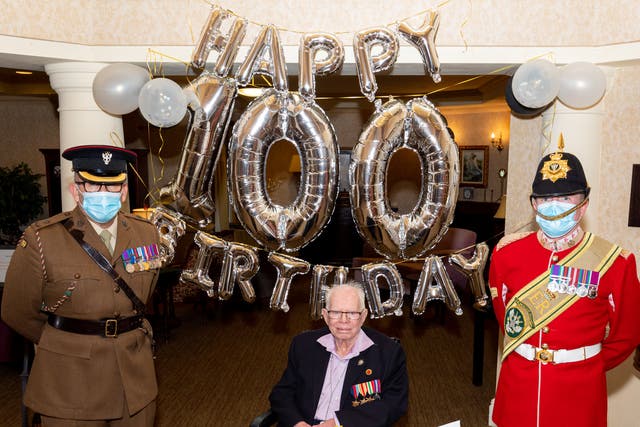 Bob King celebrated with Major Peter Lewis and Corporal Phillip Thornton (Shaun Fellows/Shine Pix/PA)