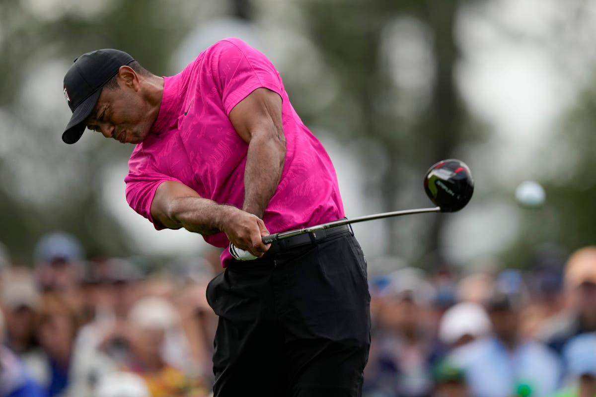 Tiger Woods gets Masters challenge under way after rain delay