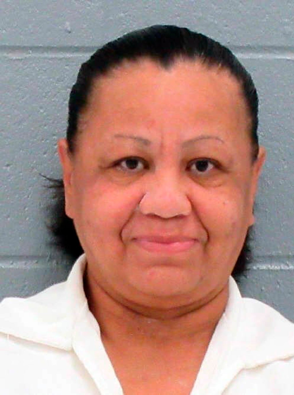 Texas lawmakers visit woman on death row with hugs, prayers