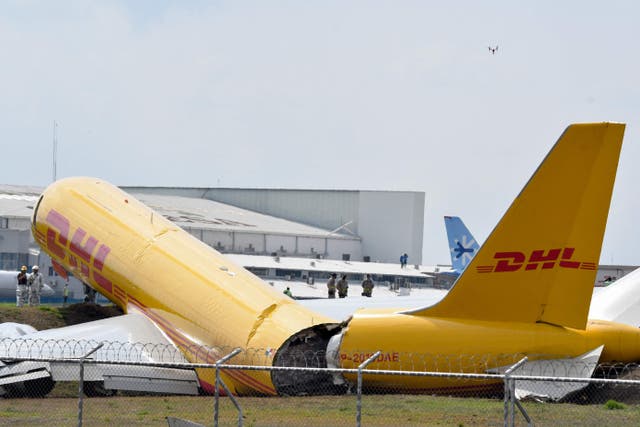 <p>A DHL cargo plane is seen after emergency landing at the Juan Santa Maria international airport due to a mechanical problem, in Alajuela, Costa Rica, on April 7, 2022. </p>