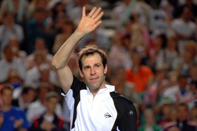 Greg Rusedski waves to the crowd after announcing his retirement at the end of his Davis Cup doubles match in Birmingham (Anna Gowthorpe/PA)