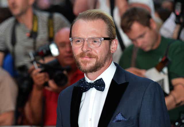<p>Hollywood actor Simon Pegg said it is a “disgrace” that soldiers in the Queen’s Guard are “still parading around with the fur of bears who were gunned down” (PA)</p>